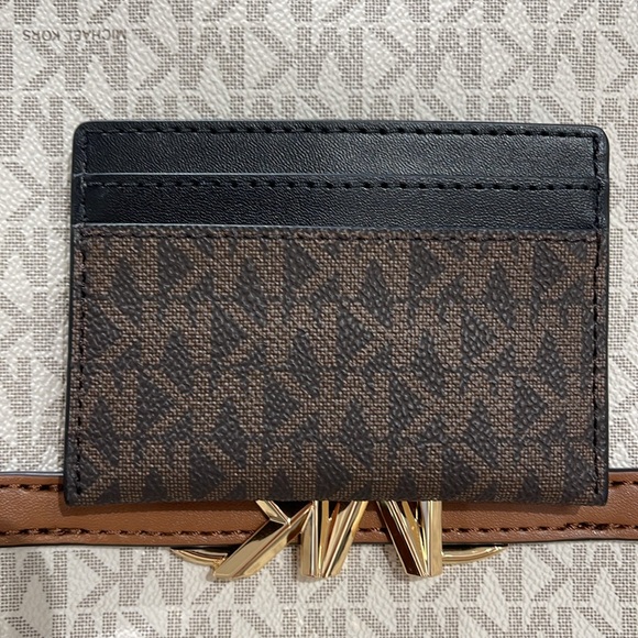 MICHAEL KORS
Reed Large Card Holder Case Wallet 
Brown/Black MK Signature 
NWT - Picture 12 of 16
